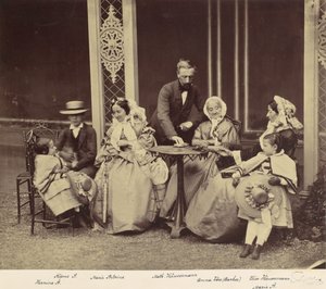 Group Portrait of Five Adults and Two Children in a Garden