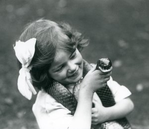 A Young Girl Betty Holding an Eastern Indigo Snake, London Zoo, 1924