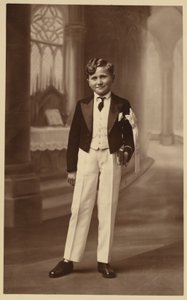 Boy Attending First Communion by French Photographer