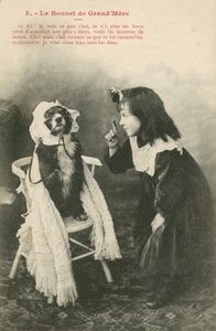 Child Dressing Her Dog in a Bonnet by French Photographer