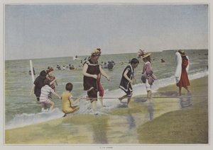 Children playing with a rope at the beach by French Photographer