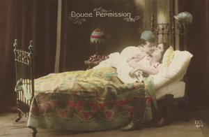 Couple kissing in bed by French Photographer