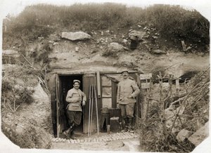 First World War: the command post of Lieutenant De Benedetti, the secretary on the left, the battalion warrant officer on the right. Between them, signal flares, periscope, torpedoes. May 1916 by French Photographer