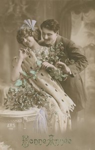 Happy New Year Greetings Card with Romantic Couple Holding Mistletoe by French Photographer