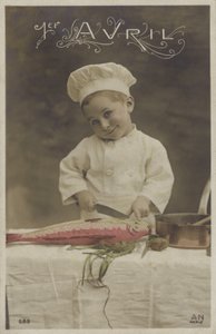 Little boy cooking a fish by French Photographer