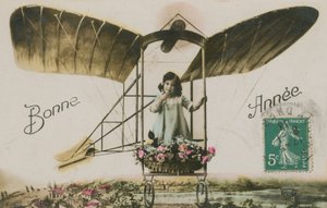 New Year greeting card of a girl in an aeroplane, 1913 by French Photographer