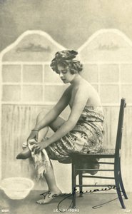 Woman in a bath towel by French Photographer