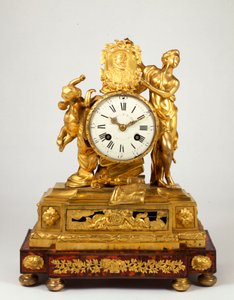 A late Louis XV ormolu mantel clock with a profile medallion of Henri IV held by Venus