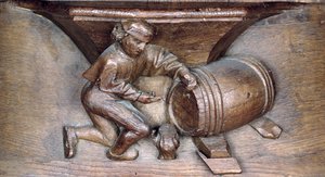 Carving depicting a man putting a tap on a barrel, from a choir stall from the Abbey of St. Lucien in Beauvais by French School