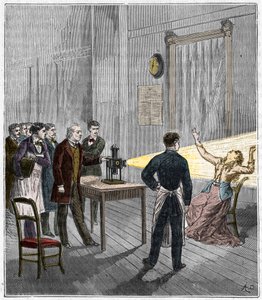 Catalepsy produced under the influence of light - The French neurologist Jean Martin Charcot (1825-1893) studying the phenomenon of hypnosis on a patient at Salpetriere hospital using a magic lantern by French School
