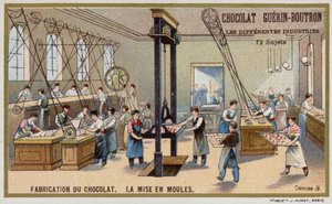 Chocolate manufacturing. Putting chocolate into moulds