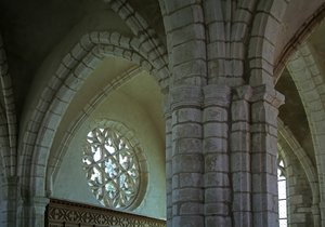 The rose window on the east wall of the south transept by French School