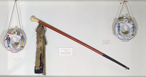Guild and trade objects, including a walking stick and gourds by French School