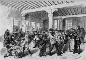 Paris, winter 1868: free distribution of clothing and bedding articles at the Mont de Piete thanks to the financial aid of Emperor Napoleon III. Engraving in "Le Monde Illustre" No. 563 of 25 January 1868.