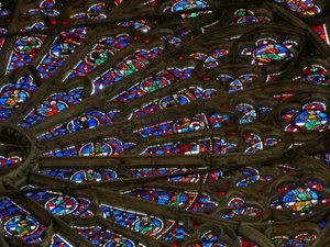 Part view of the north rose window, c.1300 by French School