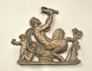 Sign from a wine merchant showing a faun drinking