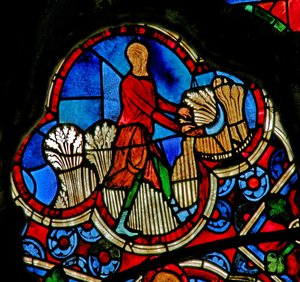 Window depicting the Labours of the Months: July