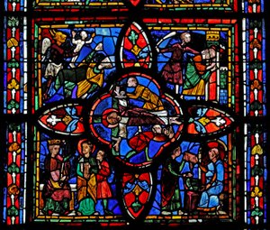 Window depicting the second section of window w7: at the centre is the crucifixion of St Peter; elsewhere is St Peter before Nero; St Peter imprisoned; the devil takes a soul by French School