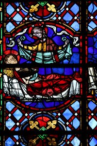 Window depicting the Charity of St Martin: he divides his cloak and this is returned by Christ by French School