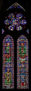 Window w102 depicting St Peter and St Andrew; Soissons Cathedral and a Bishop; in the rose Scenes from the life of St Peter by French School