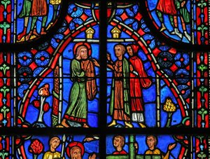 St Andrew gives away his clothes by French School