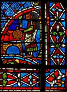 Window w11 depicting a draper donor and border panels