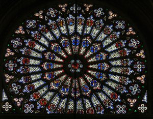 Window w121, the north rose window, depicting Apostles, Evangelists, bishops, kings, martyrs, St Peter and St Paul (rose window - internal) by French School
