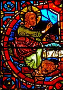 Window w17 depicting a scene from the life of St Mary Magdalene - the saint washing Christ
