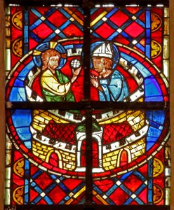 Window depicting St Denis receives communion in prison by French School