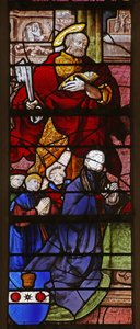 Window w21 depicting a donor and his sons with St Peter by French School