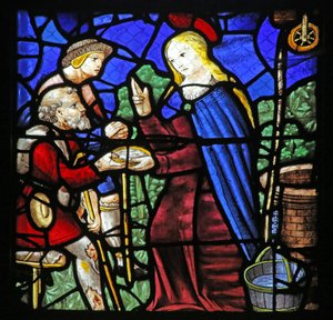 Window depicting St Genevieve gives a leper drink