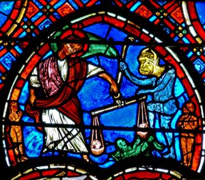 Window depicting a scene from the Last Judgement: St Michael weighing the souls