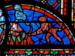 Window depicting an impenitent being tormented by demons by French School