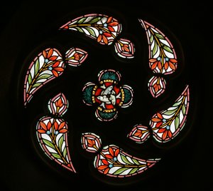 Rose window at the west end by French School