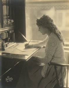 Mary Pickford writing at a desk by Bartolome Esteban and studio Murillo