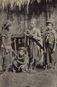 Burma: A Kachin man with the characteristic dah, and three women by Georges Bertin Scott