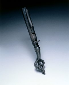 Combined wheel-lock spanner and powder measure