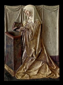 Kneeling donor Fragment of a carved altarpiece in polychrome wood. From Swabia. 1520 approx. Paris, Louvre Museum by German School