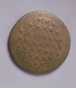 Lens-shaped weight with copper inserts
