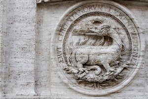 Coat of arms on facade of St Louis of French church by Giacomo della Porta