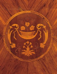 Detail from the side of a north Italian tulipwood, rosewood, fruitwood and marquetry commode