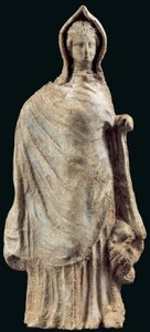 Figurine of a woman wearing a chiton and a himation covering her head, possibly from Myrina, Asia Minor, 250-200 BC by Greek