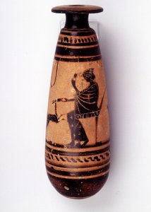Painting on vase: alabaster used to contain the perfume: one face depicts a woman playing with a doe and holding a flower. Her basket to hold the wool is behind her. 500 BC. BNF, Medal Office