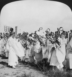 Shinto priests in a funeral procession for Hitachi Maru victims, Tokyo, Japan by H. C. White
