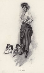 Portrait of a woman dressed for the countryside with her bulldog