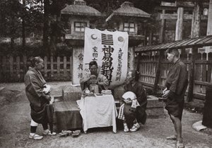 A Fortune-Teller at Inari Temple by Herbert Ponting