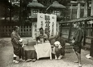 A Fortune-Teller at Inari Temple by Herbert Ponting