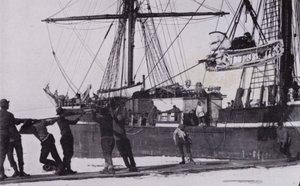 The motor sledges were unpacked and landed by Herbert Ponting