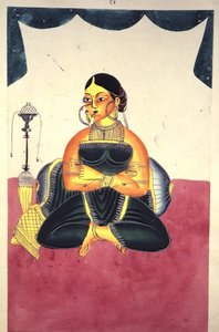 A Courtesan seated cross-legged beside a 