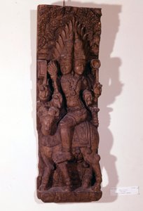 Agni, god of fire, depicted with two heads on a ram, according to Hindu mythology. Wood sculpture of the 17th century. Paris, Musée Guimet by Indian School